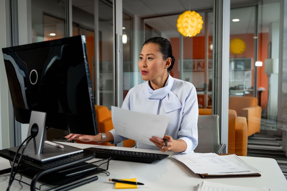 SAP_Concur_Woman_Glass_Office_Computer (1).jpg