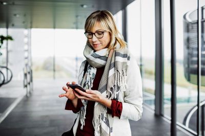 woman casually reading phone.jpg